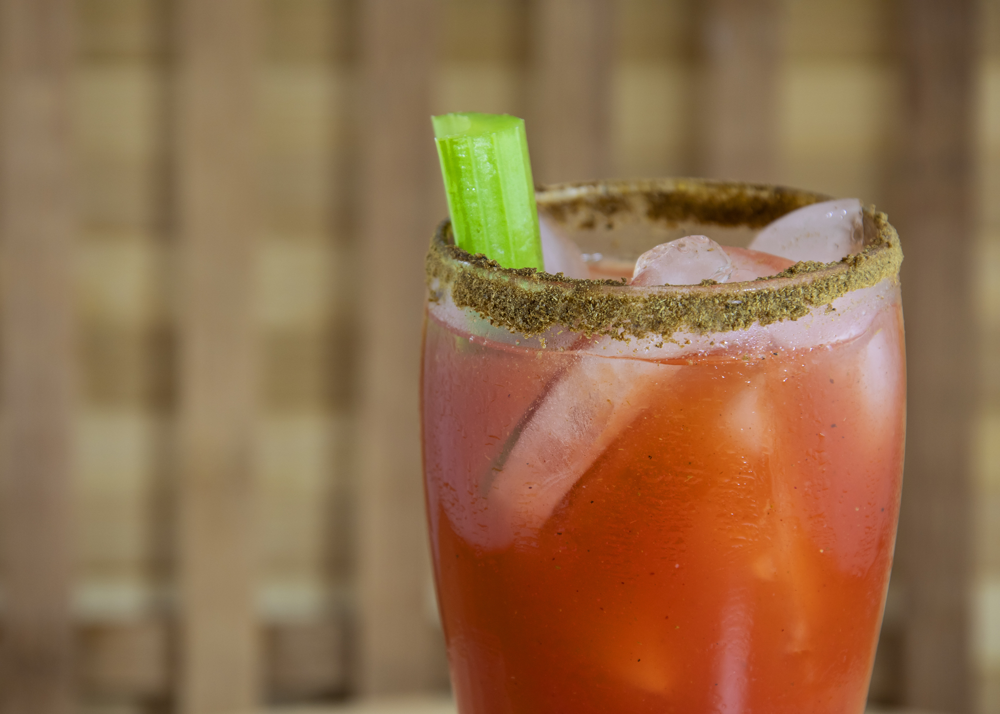 Half glass of a Canadian caesar cocktail