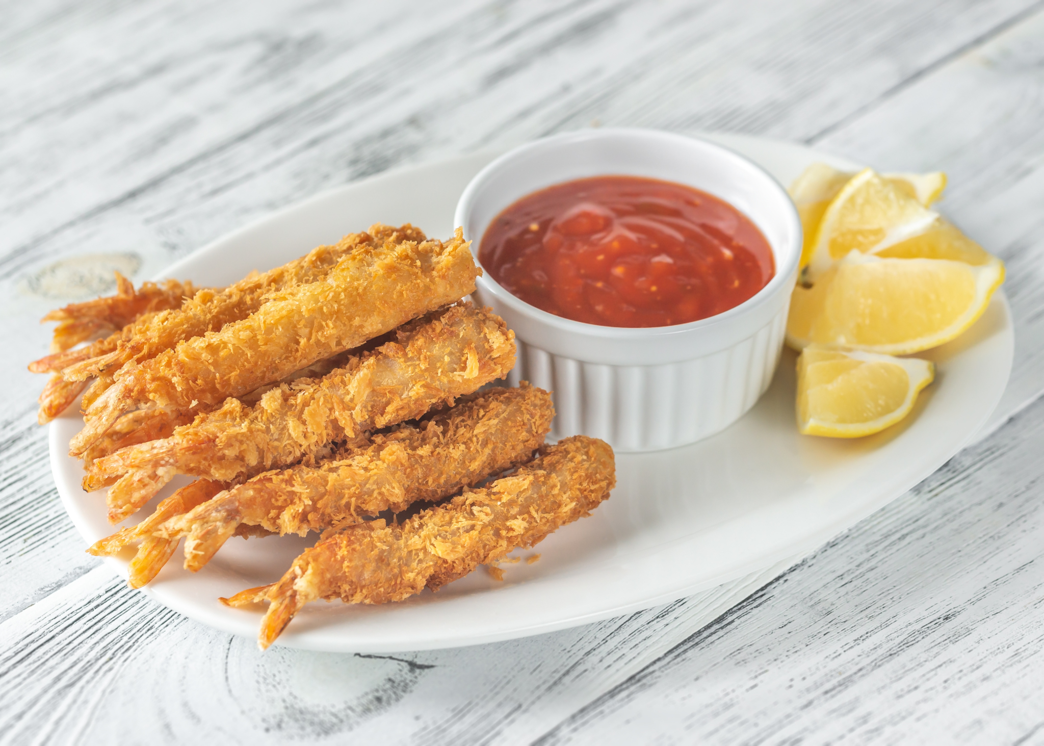 Shrimp tempura with sauce on the plate